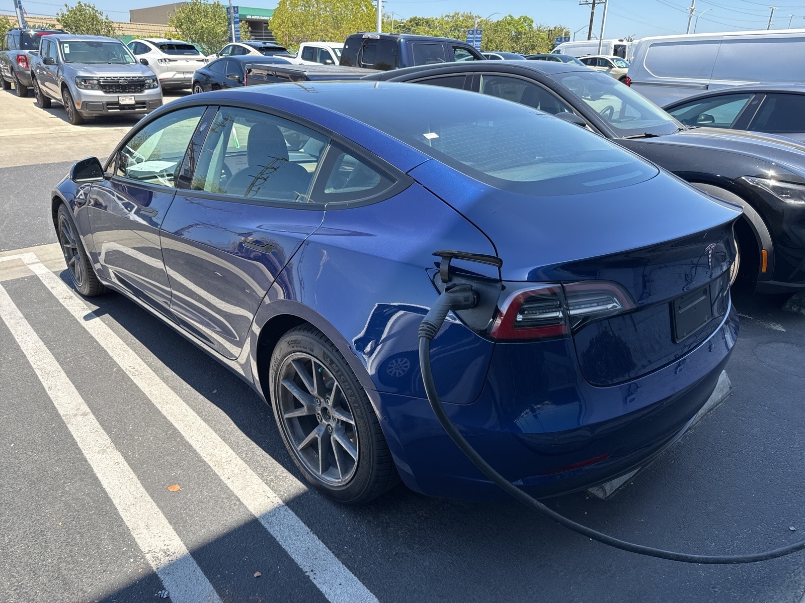 Used 2022 Tesla Model 3 Long Range with VIN 5YJ3E1EB5NF266170 for sale in Long Beach, CA