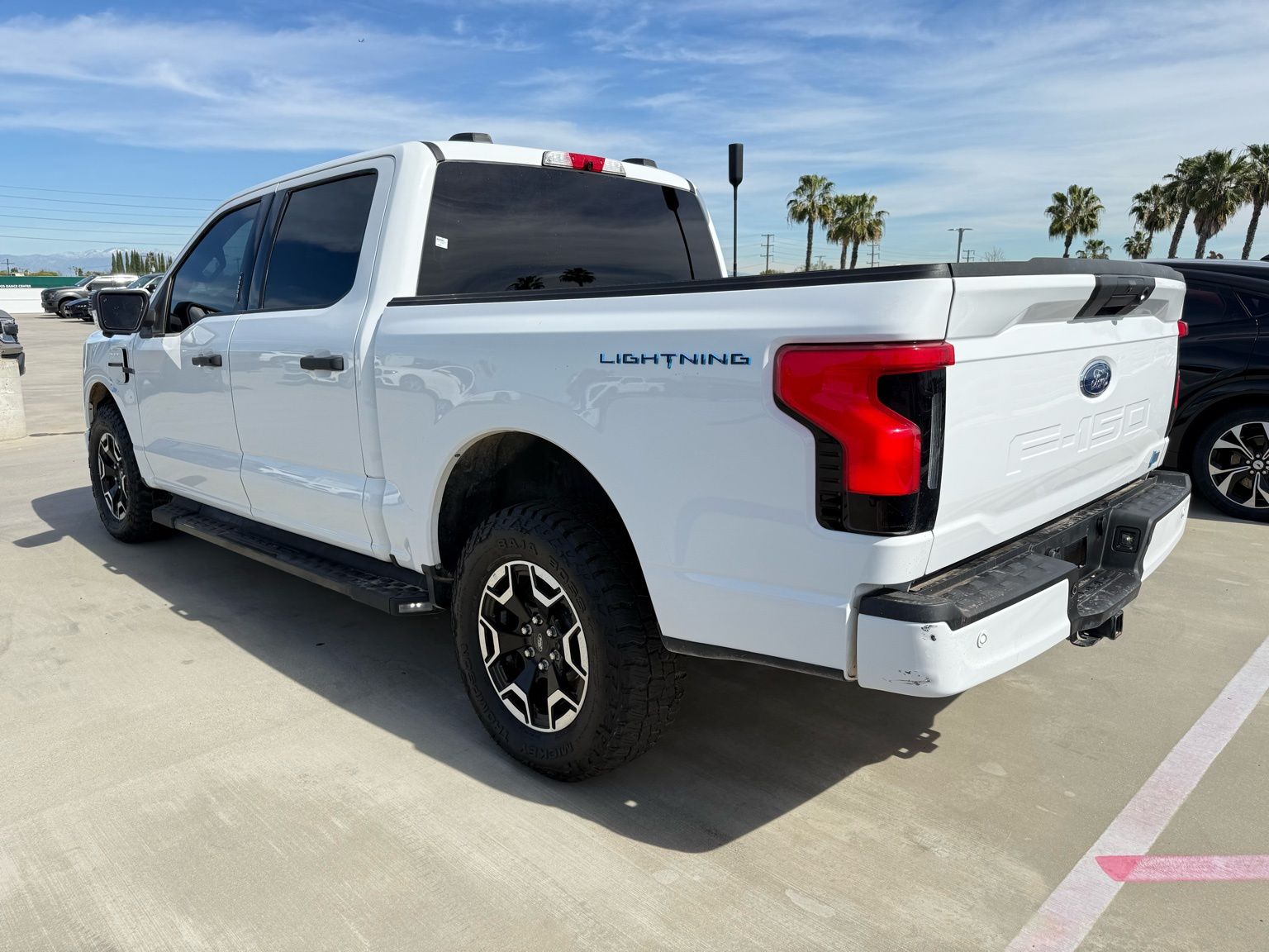 Used 2022 Ford F-150 Lightning XLT with VIN 1FTVW1EL1NWG06022 for sale in Long Beach, CA