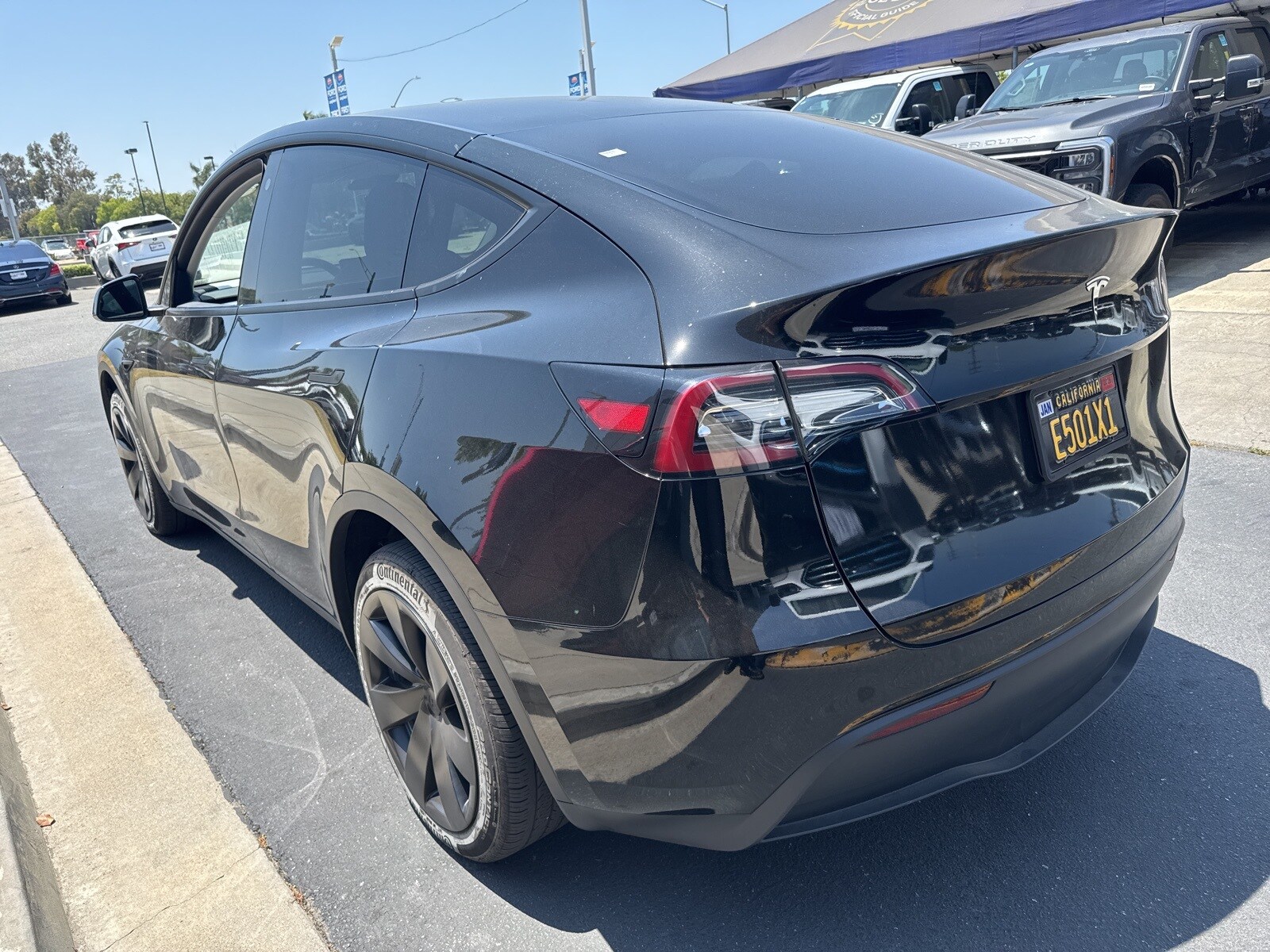 Used 2023 Tesla Model Y Long Range with VIN 7SAYGDEE2PF645676 for sale in Long Beach, CA
