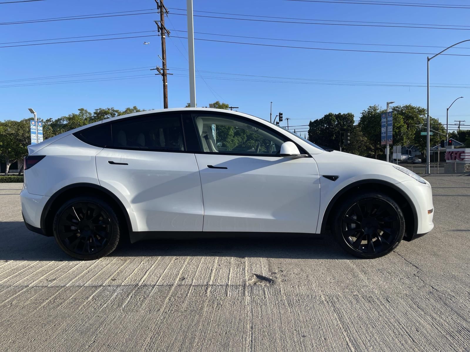 Used 2023 Tesla Model Y Long Range with VIN 7SAYGDEE2PF621801 for sale in Long Beach, CA