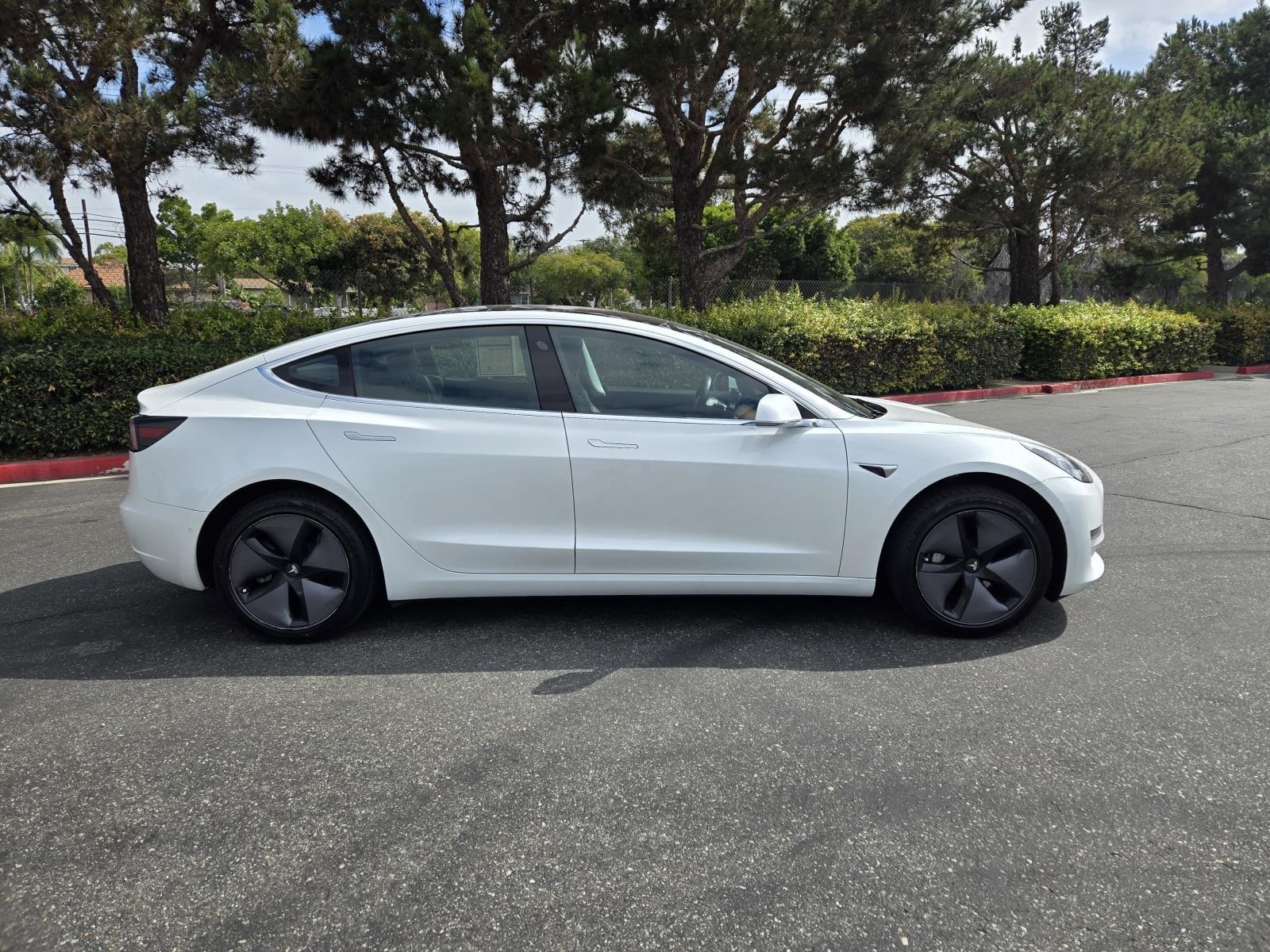 Used 2019 Tesla Model 3 Base with VIN 5YJ3E1EA1KF299766 for sale in Long Beach, CA