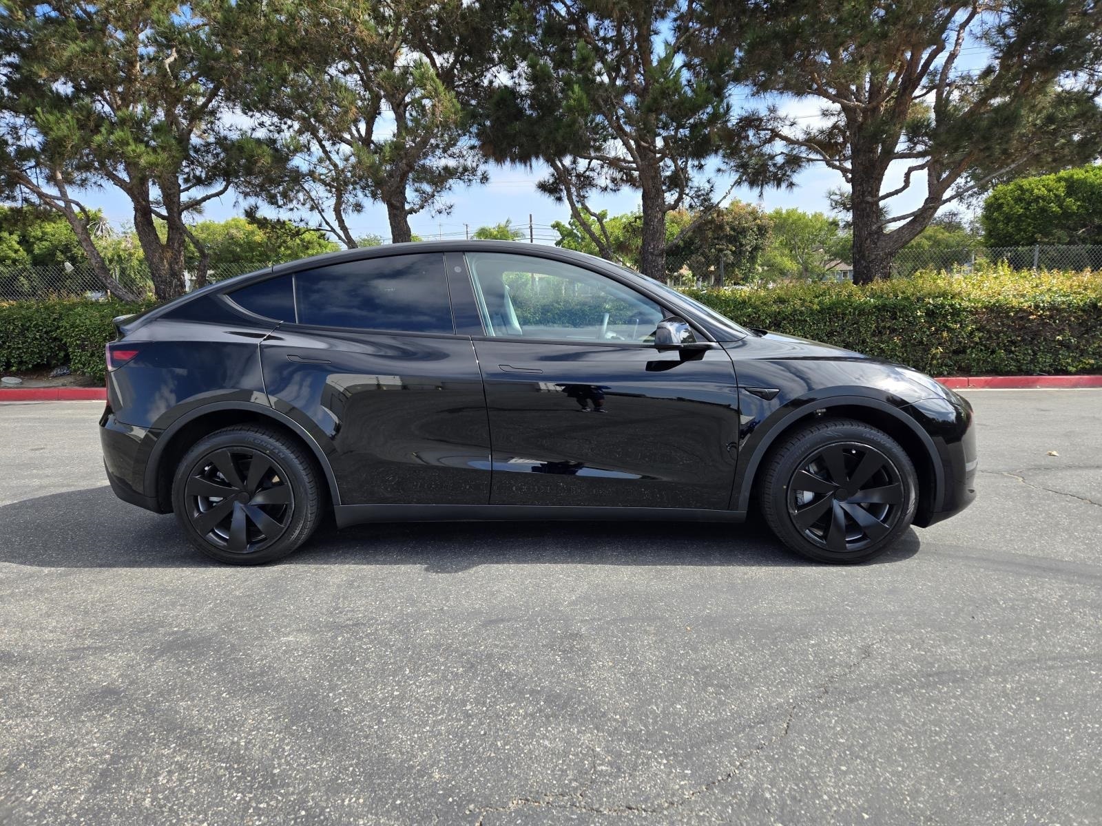 Used 2023 Tesla Model Y Long Range with VIN 7SAYGDEE2PF645676 for sale in Long Beach, CA