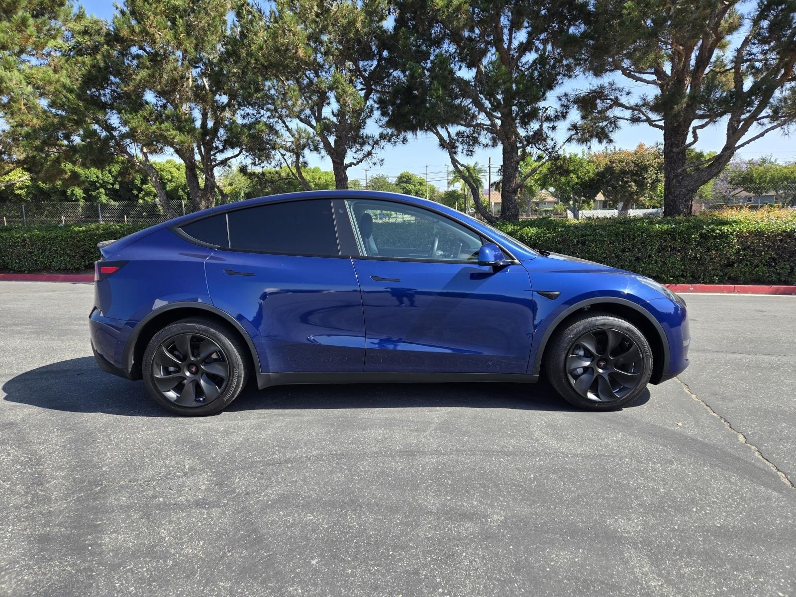 Used 2023 Tesla Model Y Long Range with VIN 7SAYGDEEXPF643822 for sale in Long Beach, CA