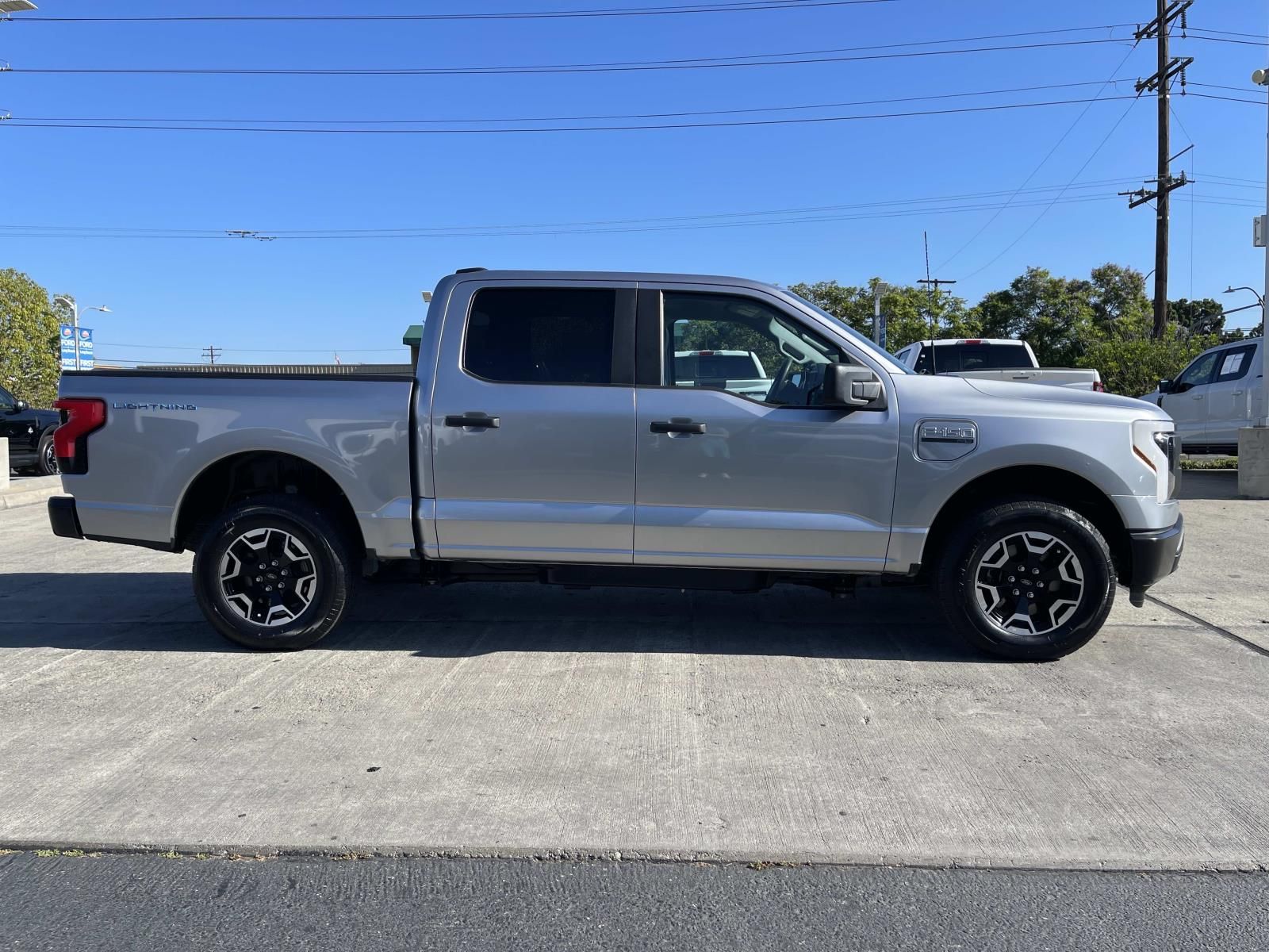 Used 2022 Ford F-150 Lightning Platinum with VIN 1FT6W1EV1NWG02722 for sale in Long Beach, CA