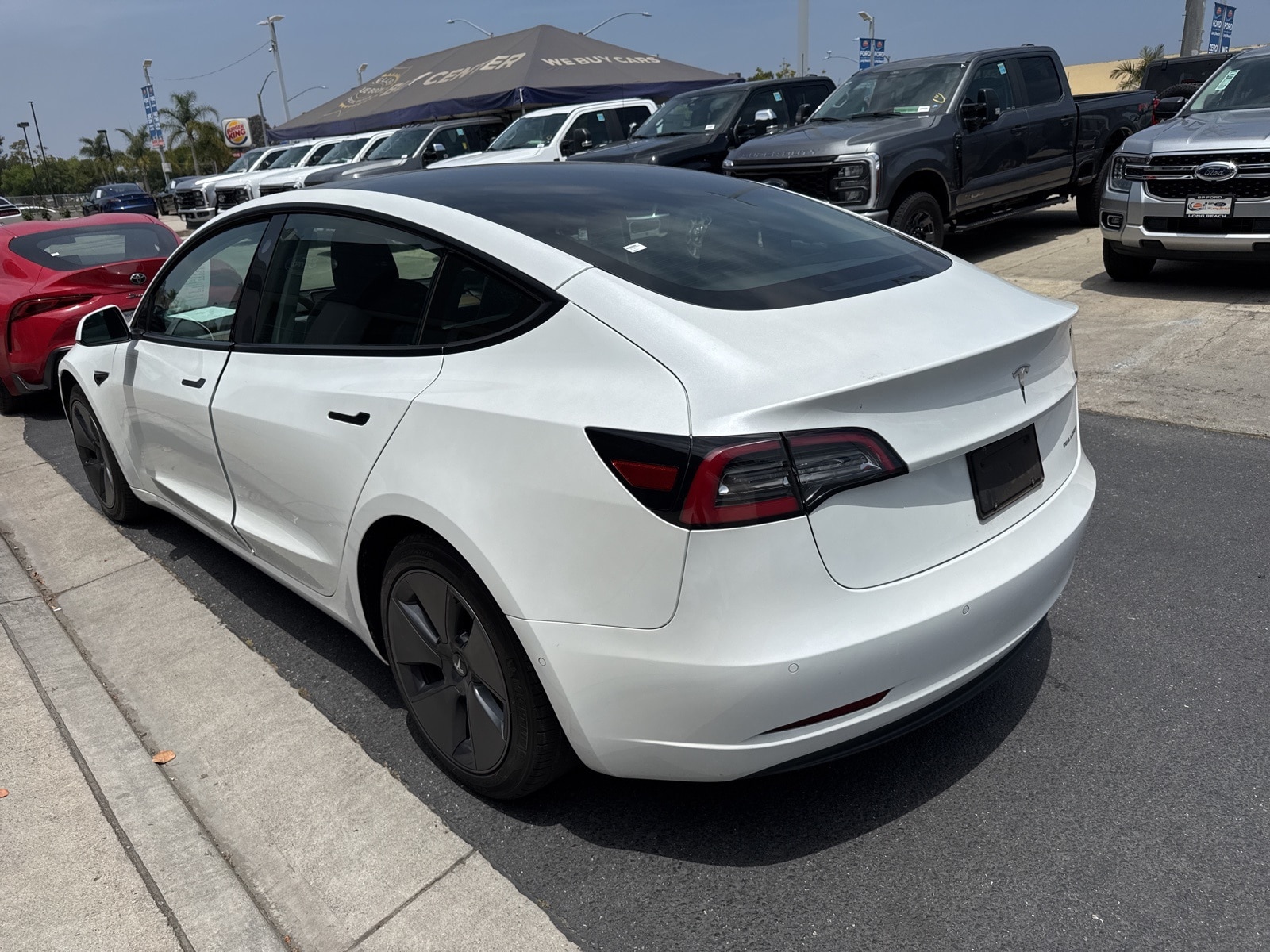 Used 2022 Tesla Model 3 Long Range with VIN 5YJ3E1EB0NF244576 for sale in Long Beach, CA