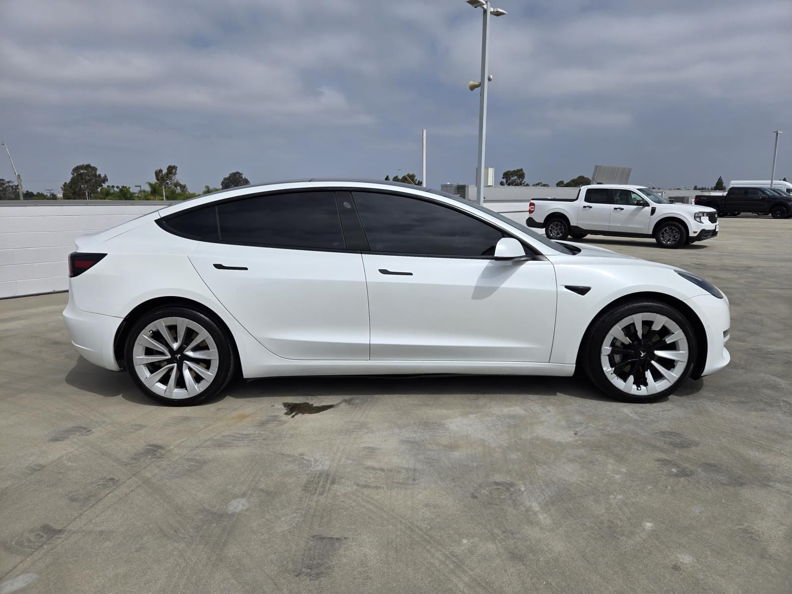 Used 2022 Tesla Model 3 Base with VIN 5YJ3E1EA0NF188940 for sale in Long Beach, CA