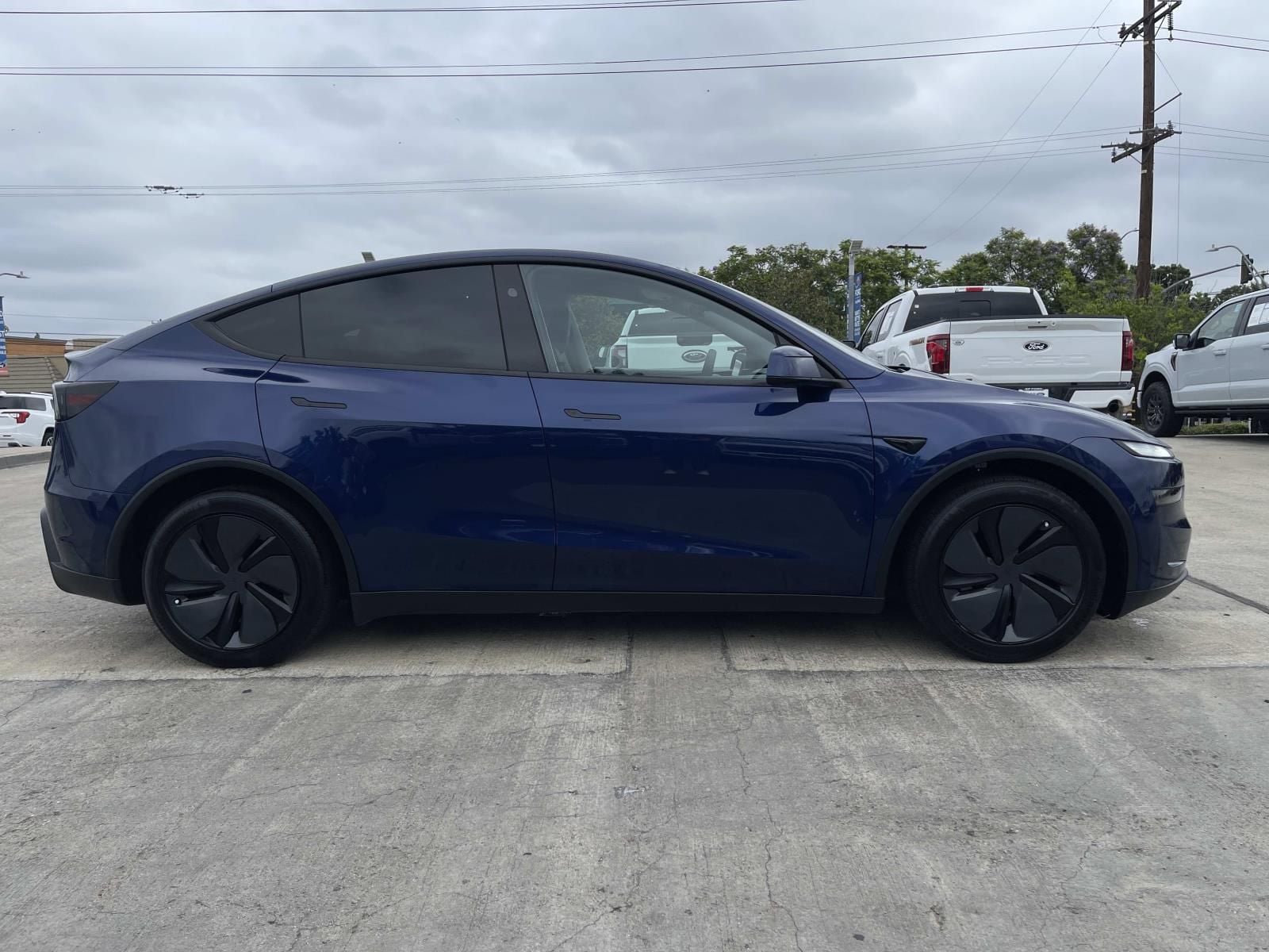 Used 2026 Tesla Model Y Premium with VIN 7SAYGDED1TF383411 for sale in Long Beach, CA