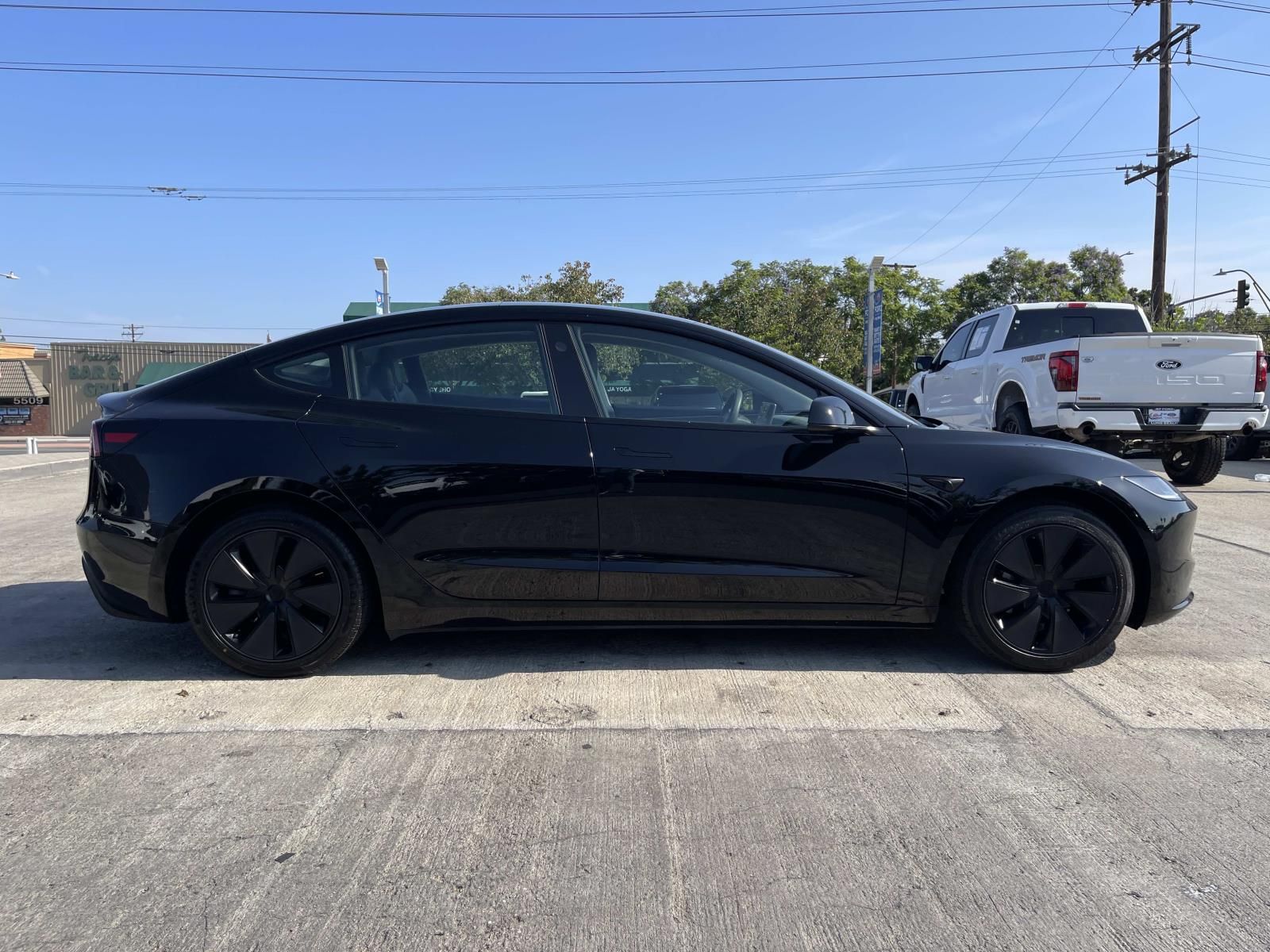 Used 2025 Tesla Model 3 Long Range with VIN 5YJ3E1EAXSF912984 for sale in Long Beach, CA