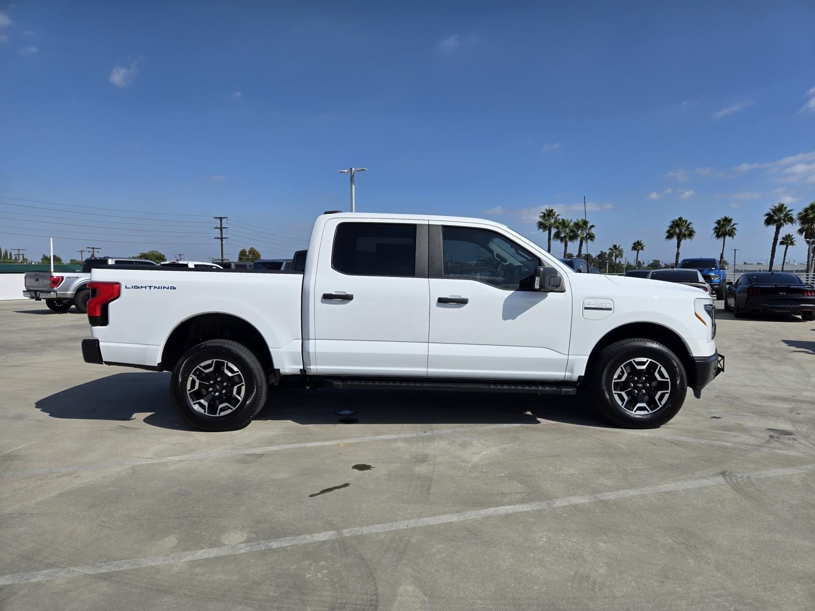 Used 2022 Ford F-150 Lightning Pro with VIN 1FTVW1ELXNWG00204 for sale in Long Beach, CA