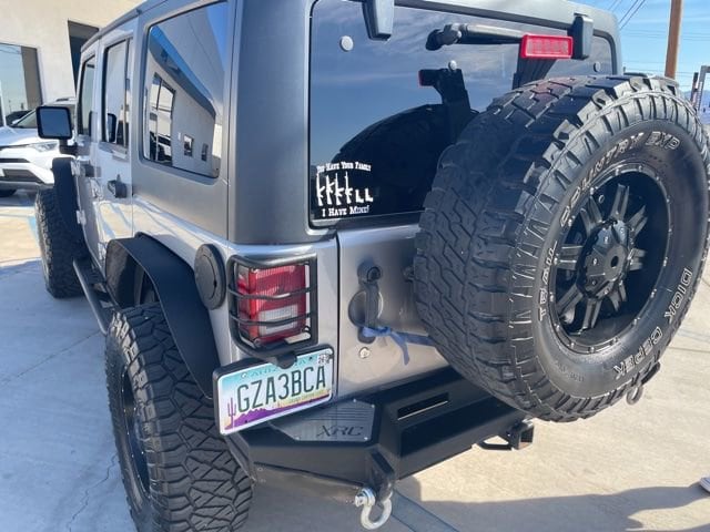 Used 2013 Jeep Wrangler Unlimited Sahara with VIN 1C4BJWEG0DL644858 for sale in Parker, AZ