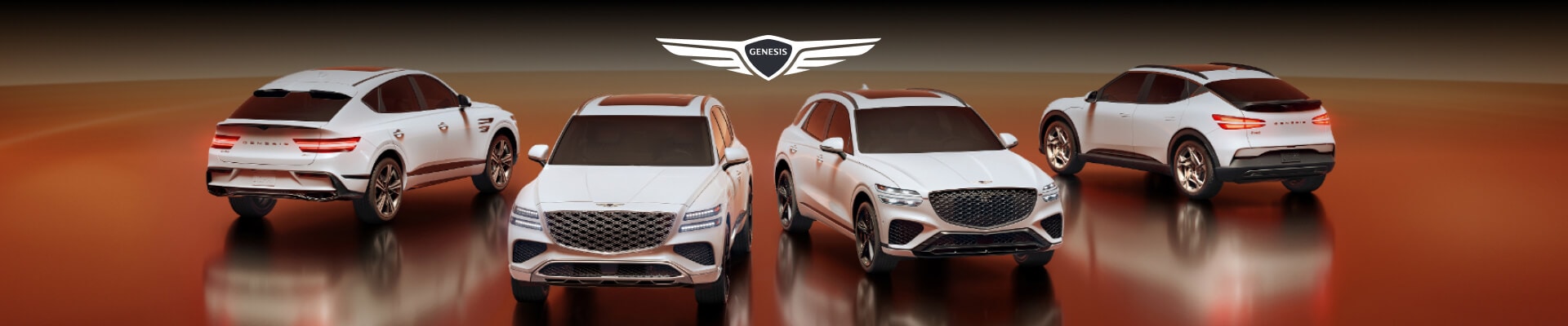 The Genesis line of Sedans parked side by side in an open reflective orange room.