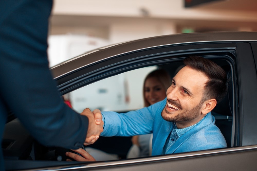 Man Buying New Genesis