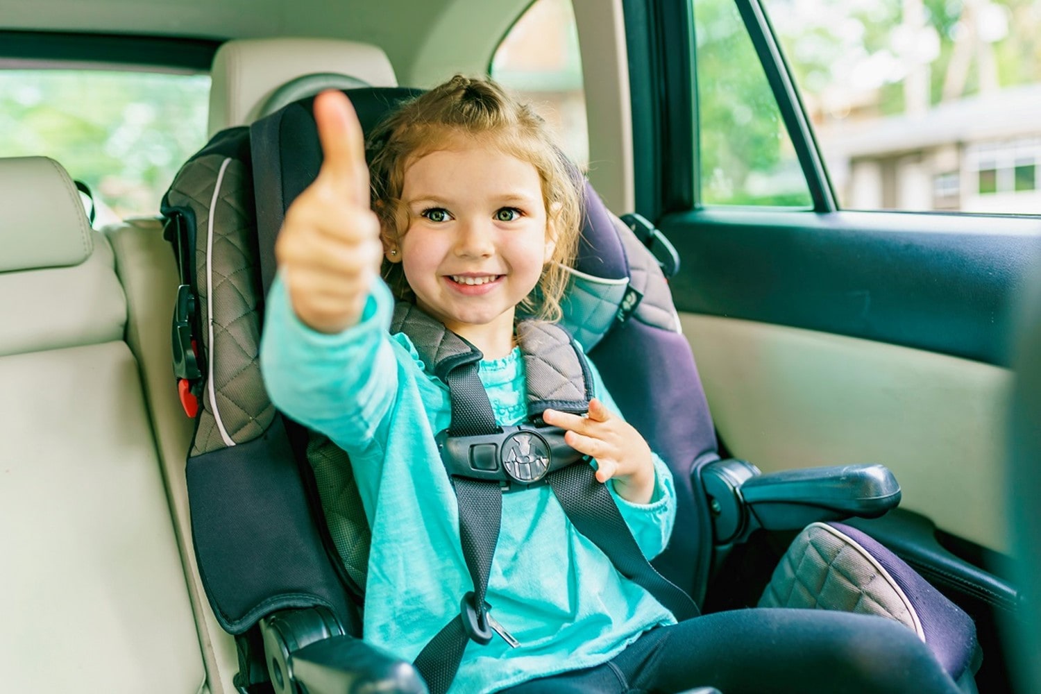 Happy Child in Car Seat in Hyundai