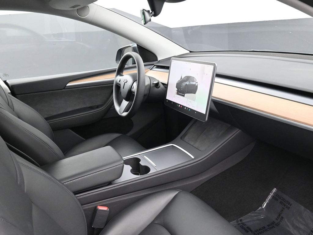 Used 2024 Tesla Model Y Long Range with VIN 7SAYGDEEXRA279899 for sale in Miami, FL