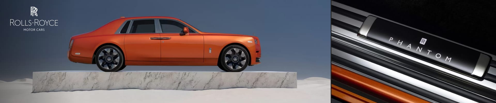 2026 Rolls-Royce Phantom in Crystal over Orange Metallic and in side profile on marble platform, set against a blue sky. Close-up of Phantom logo on sleek, metallic trim. Luxurious and elegant.