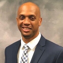 Staff member John Evans, Sales Manager from ID_cbaab37bc62e