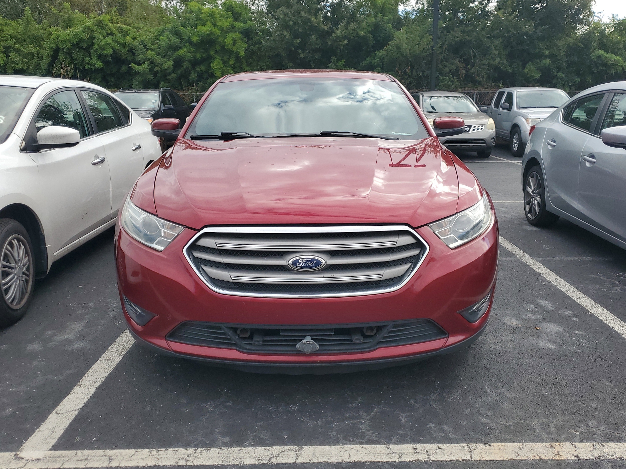 Used 2014 Ford Taurus SEL with VIN 1FAHP2E87EG139698 for sale in Tampa, FL
