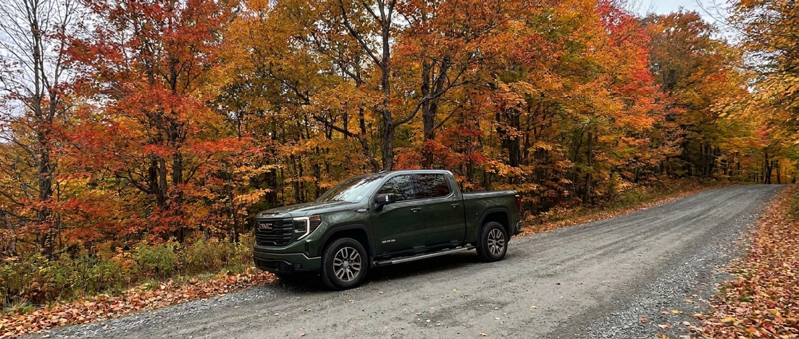 2026 GMC Sierra 1500 on a Vermont fall road ready for foliage season driving
