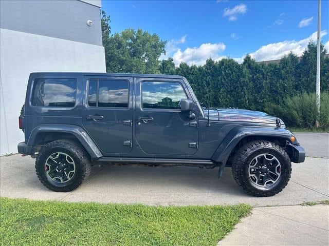 Used 2016 Jeep Wrangler Unlimited Rubicon with VIN 1C4HJWFG7GL318973 for sale in Saint Albans, VT