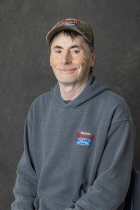 Staff member Eugene C. from ID_a03036
