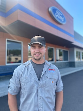 Staff member John Breaman from ID_6d6d1261a0bb