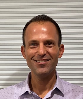 Staff member John Sagat Jr from ID_71d335