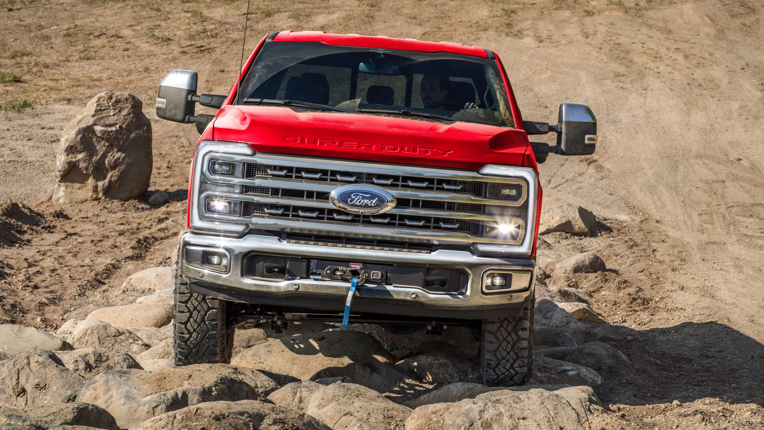 2026 Ford Super Duty of roading on rocky terrain
