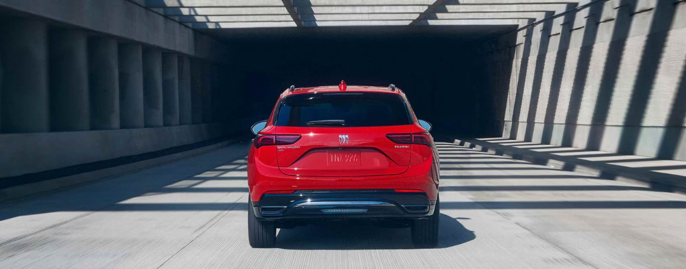 Red 2026 Buick Envision driving into a tunnel