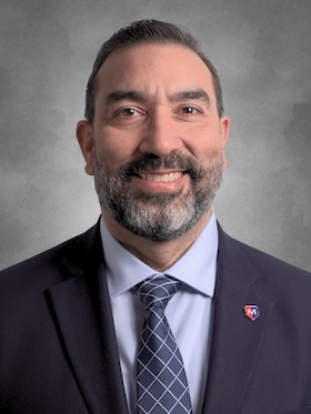 Staff member Frank Arias from eab732b87127