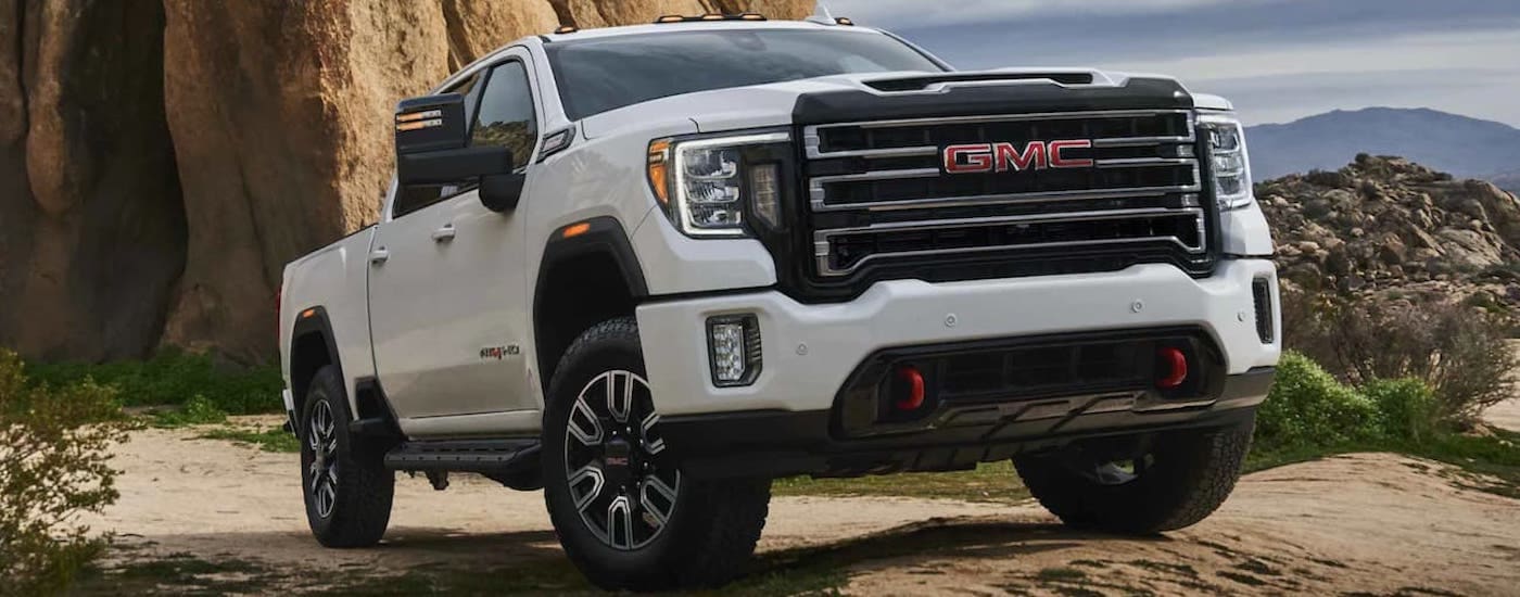 White 2022 GMC Sierra 2500 HD AT4 parked off-road