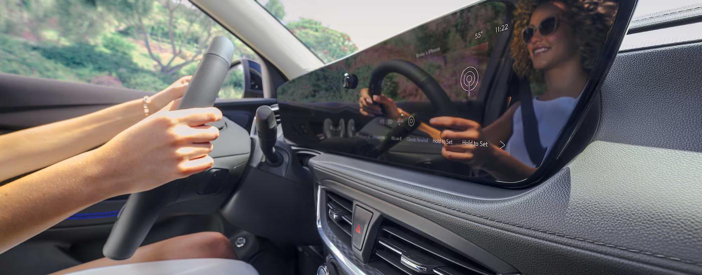 Person test driving a 2025 Buick Encore GX for sale in Miami