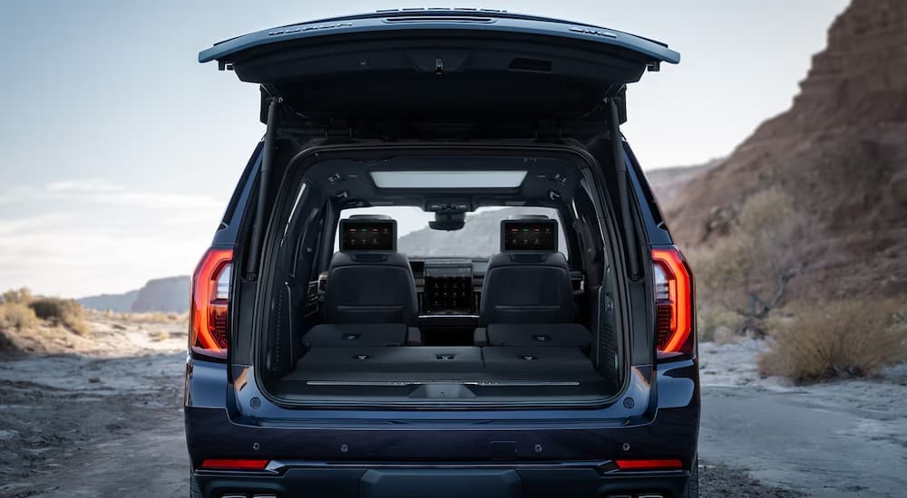 Open liftgate on a blue 2026 GMC Yukon at a dealer near Doral