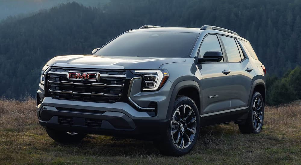 Grey 2026 GMC Terrain driving off-road