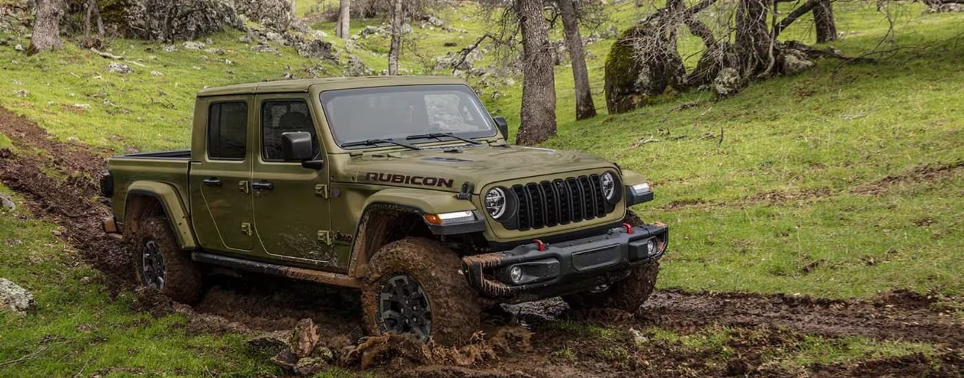 Green 2026 Jeep Gladiator Rubicon off-roading