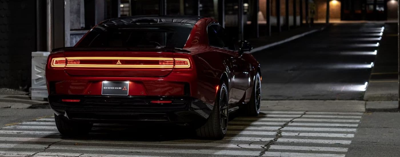 Illuminated brake lights on a red 2025 Dodge Charger Daytona
