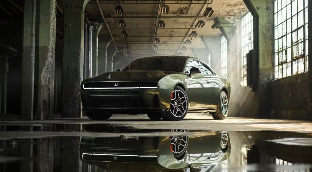 Green 2026 Dodge Charger parked in a warehouse