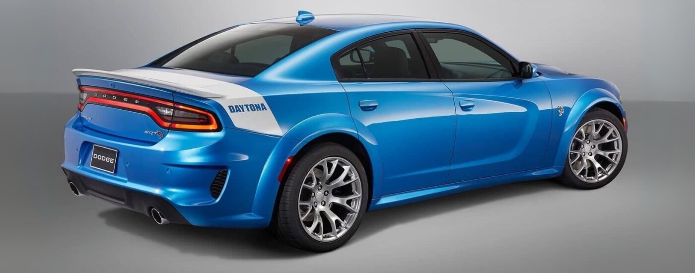 Blue 2020 Dodge Charger Daytona against a grey backdrop
