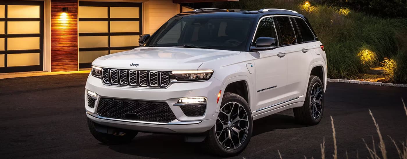 A white 2025 Jeep Grand Cherokee L parked from a dealer near Miami Beach