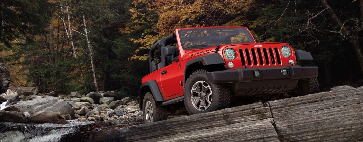 Red 2017 Jeep Wrangler for sale near Doral parked off-road