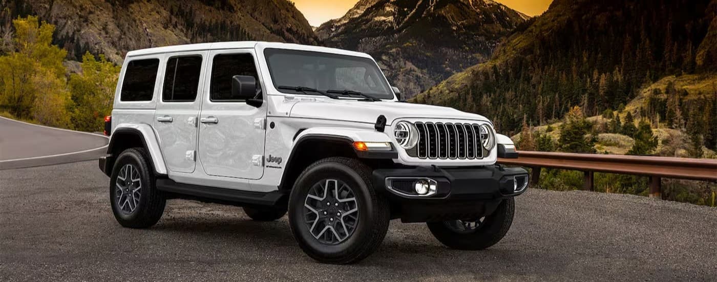 A white 2025 Jeep Wrangler parked after visiting a Jeep dealer near Kendall.