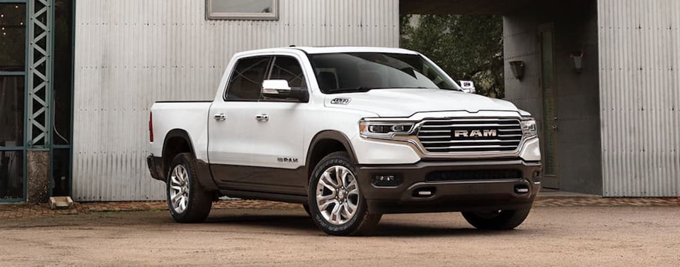 A white 2020 Ram 1500 from the front after leaving a used car dealer near Coral Gables.