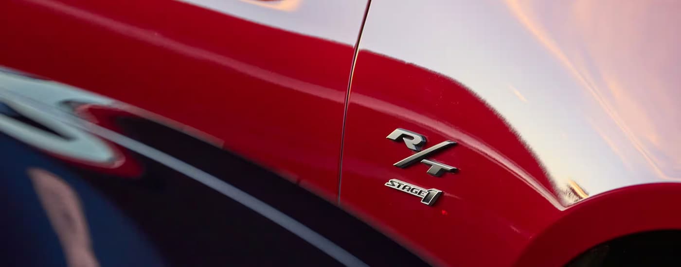 Close up of the side and badge on a red 2025 Dodge Charger Daytona for sale near Key Biscayne