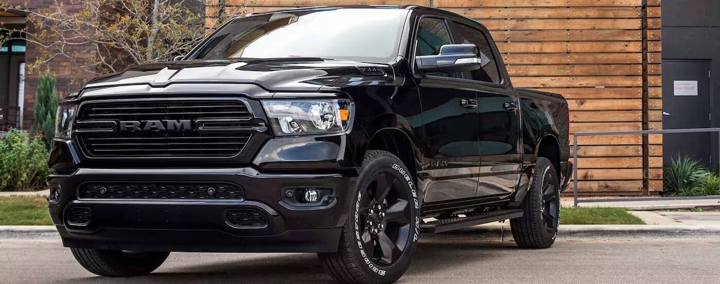A black 2024 Ram 1500 for sale near Kendal is parked.