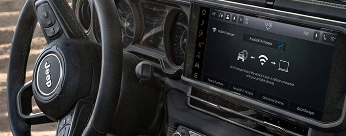 Steering wheel and dashboard in a 2026 Jeep Gladiator