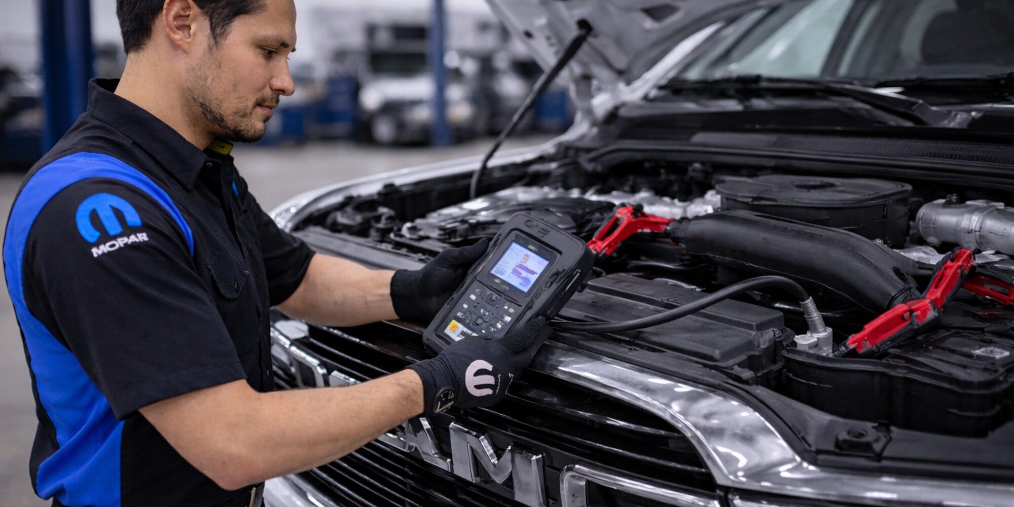 bproauto battery service on a Ram at Brickell CDJR