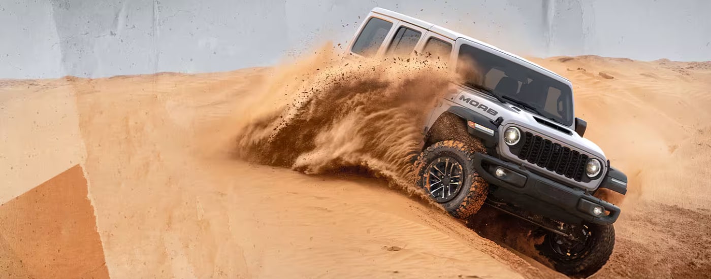 Silver 2026 Jeep Wrangler MOAB Edition off-roading