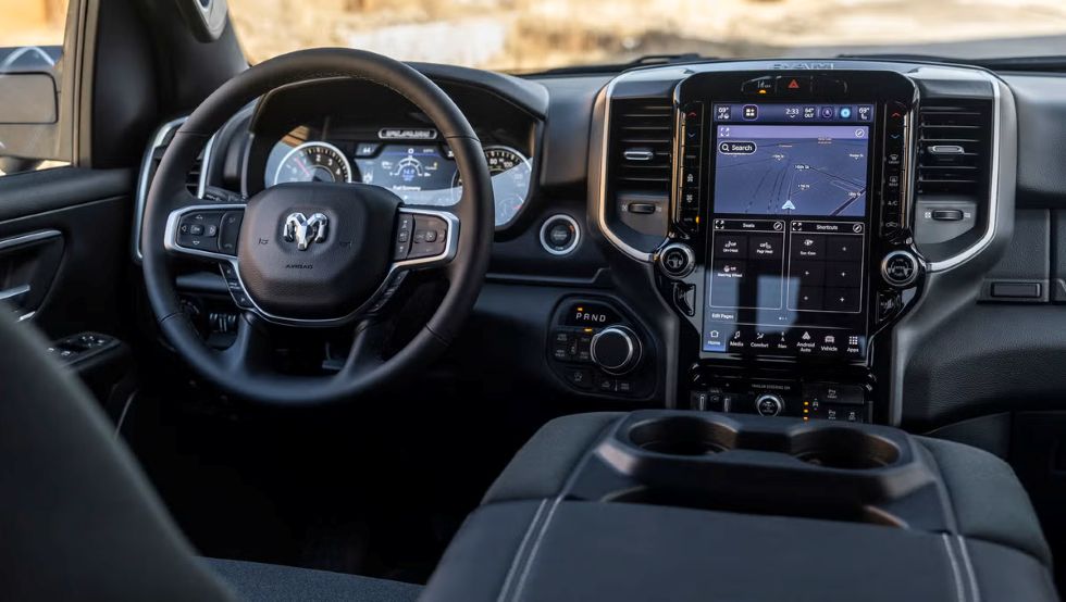Ram 1500 dashboard with a digital instrument cluster and a large vertical touchscreen