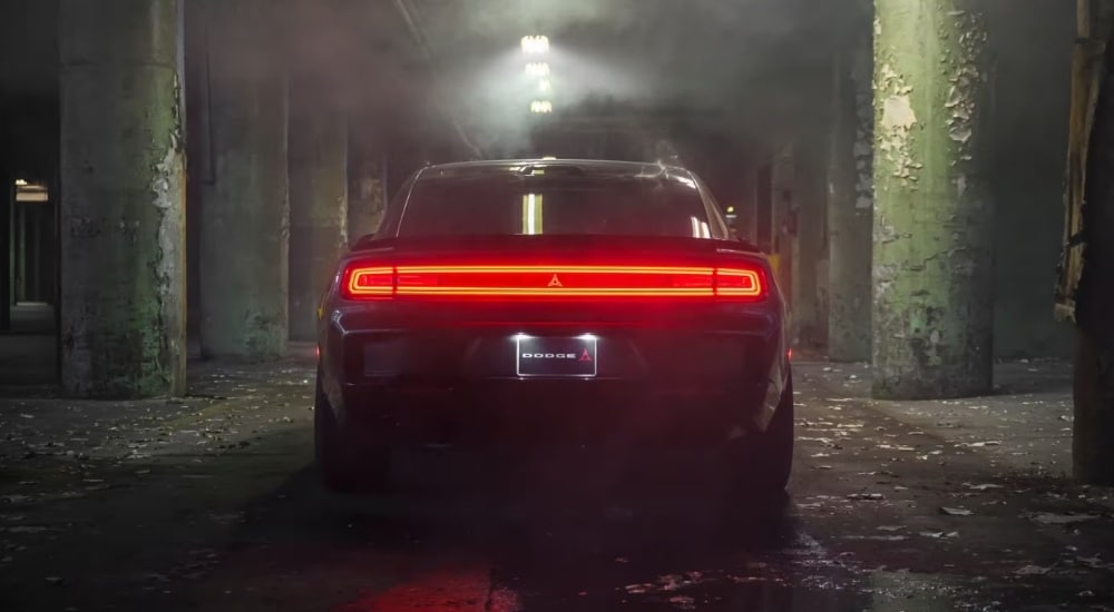 Green 2026 Dodge Charger parked in a warehouse