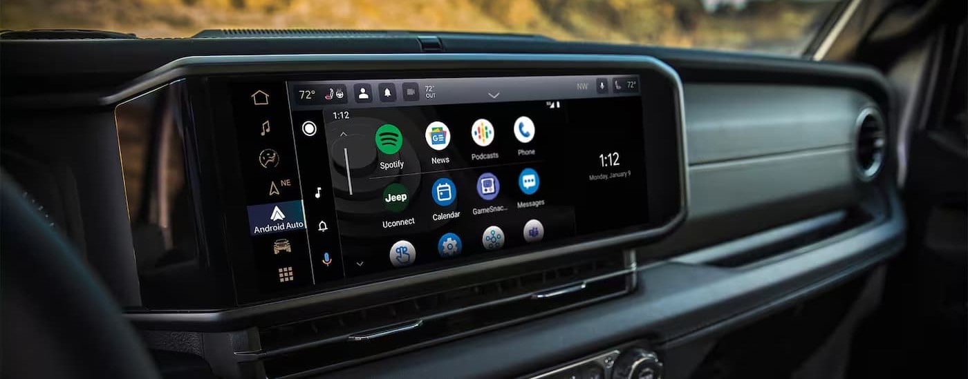 Close-up of an infotainment screen in a 2025 Jeep Wrangler for sale near Kendall.