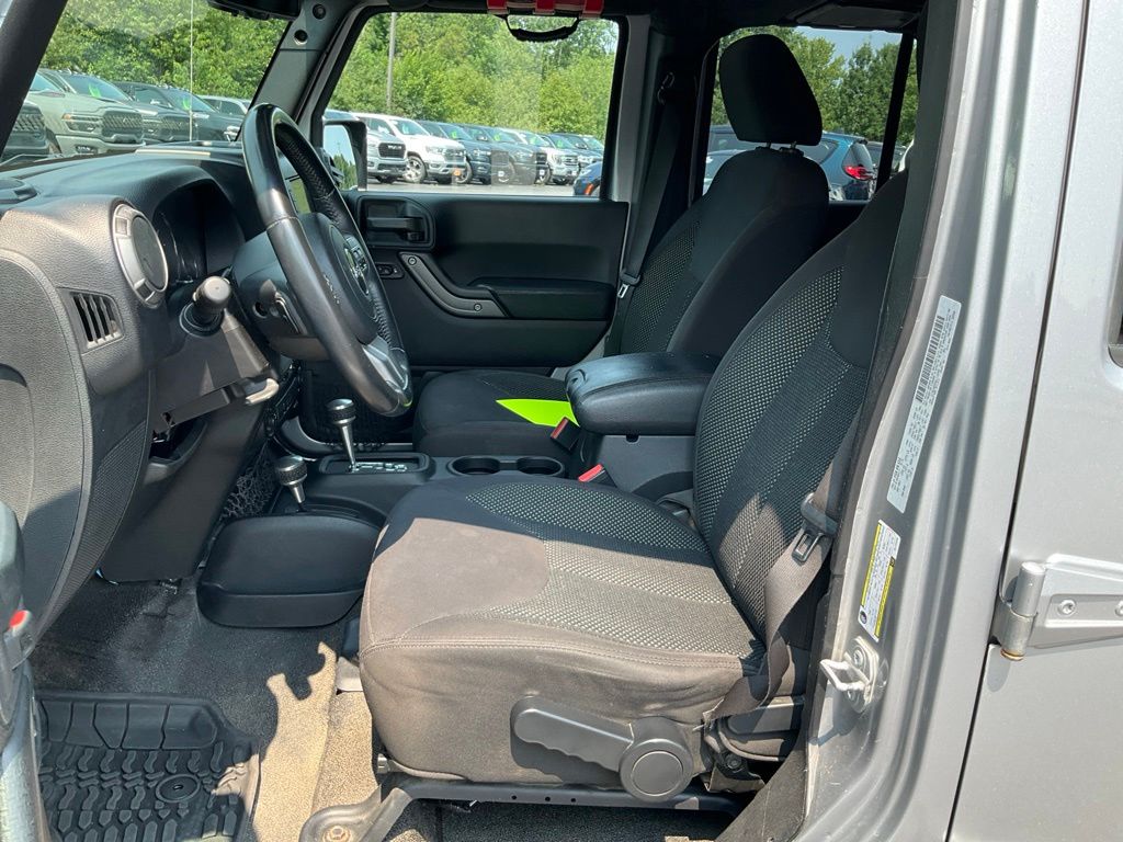 Used 2016 Jeep Wrangler Unlimited Black Bear with VIN 1C4BJWDG5GL114245 for sale in Merrill, WI